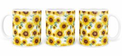 Kubek z wzorem jasnożółtych słoneczników na białym tle widoczny z trzech stron